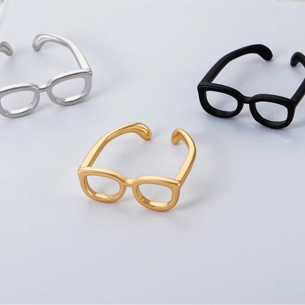 Gold, Silver, and Black Glasses Rings